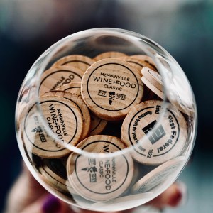 Tasting tokens for the McMinnville Wine + Food Classic 2023, Evergreen Aviation and Space Museum. Photo courtesy Eagle Eye Droneography.